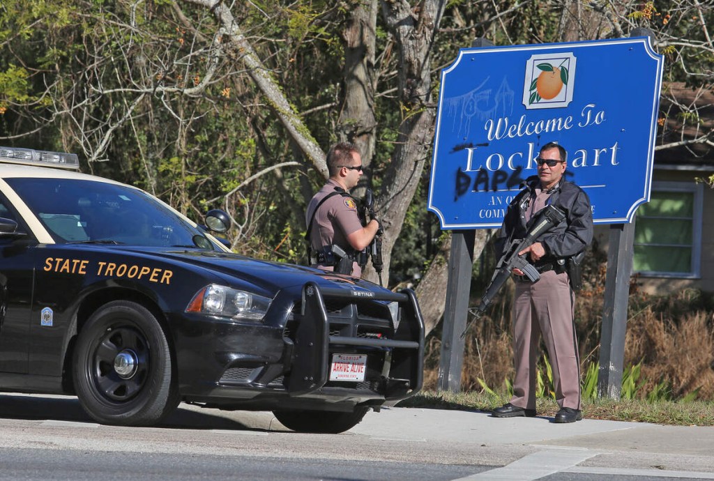 Florida Highway patrol troopers secure the roadways