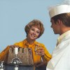 Lady smiling with soda jerk vintage image