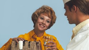 Lady smiling with soda jerk vintage image