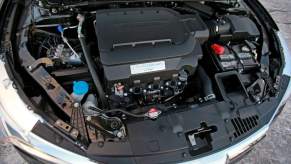 A V6 engine under the hood of a 2016 Honda Accord EX-L midsize sedan model