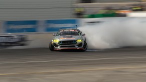 James Deane drifting his righ-hand drive RTR Spec 5 FD formula drift cars at Irwindale Speedway in October 2023