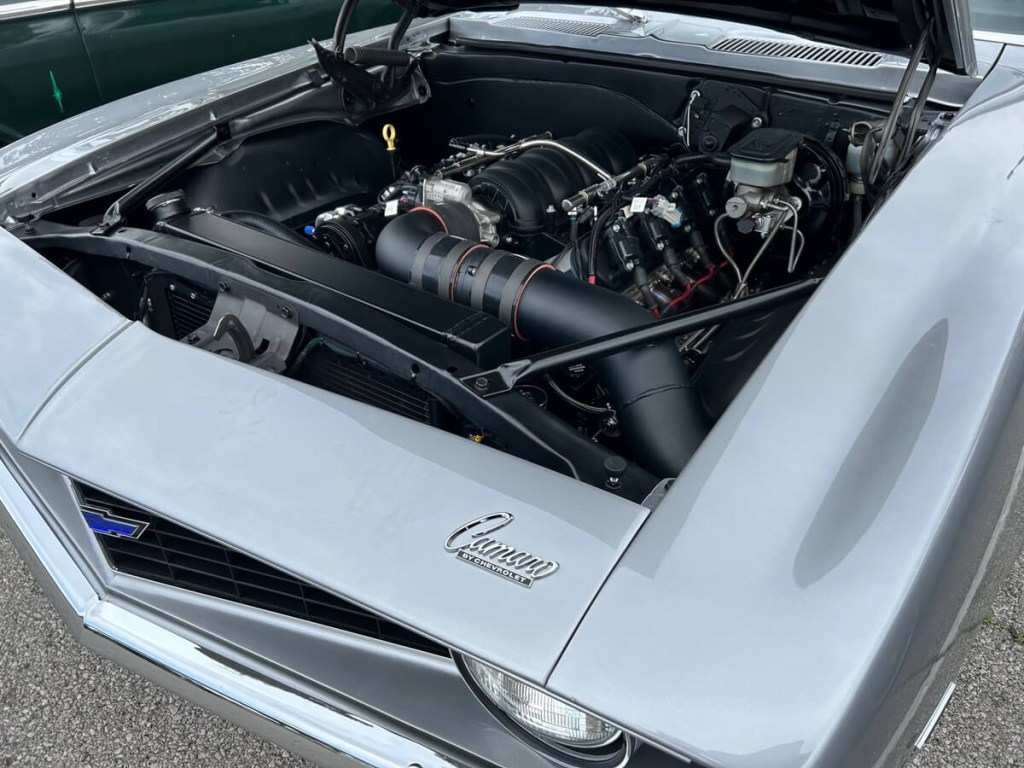 A custom 1969 Chevrolet Camaro shows off its LS swap, replacing its original engine build. 