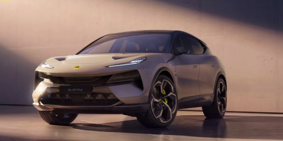 A gray Lotus Eletre electric SUV is parked, it makes 905 horsepower.