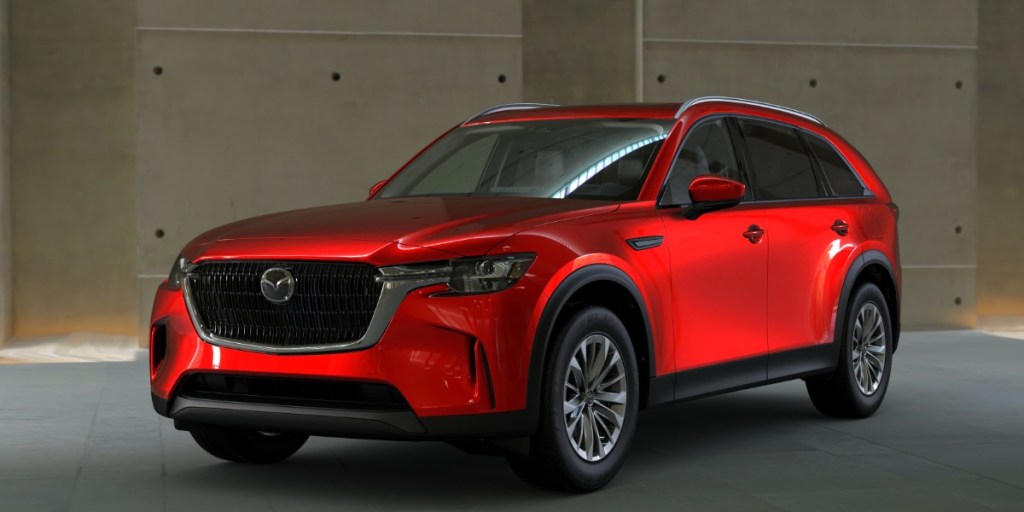 A 2024 Mazda three-row SUV in Soul Red Crystal Metallic