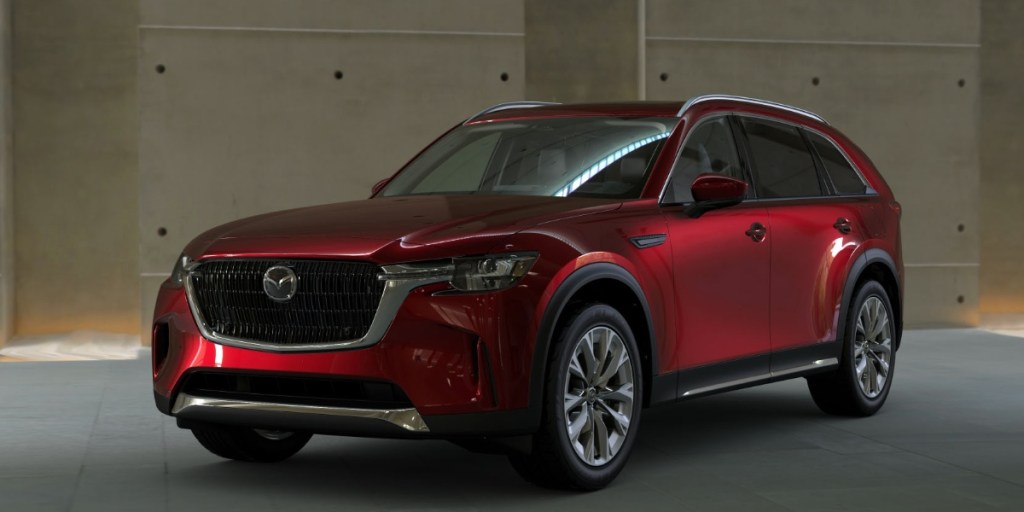 A 2024 Mazda midsize SUV in Artisan Red Premium.