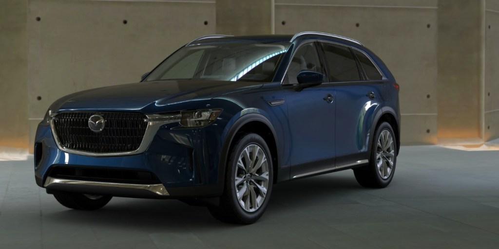 A 2024 Mazda CX-90 in Deep Crystal Blue Mica.