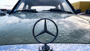 Antique Mercedes-Benz sedan emblem
