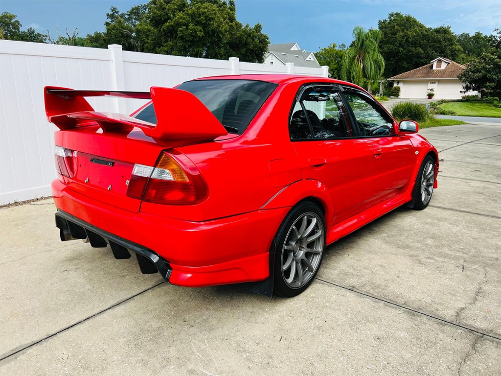 Rear 3/4 of a 1996 Mitsubishi Lancer Evolution IV