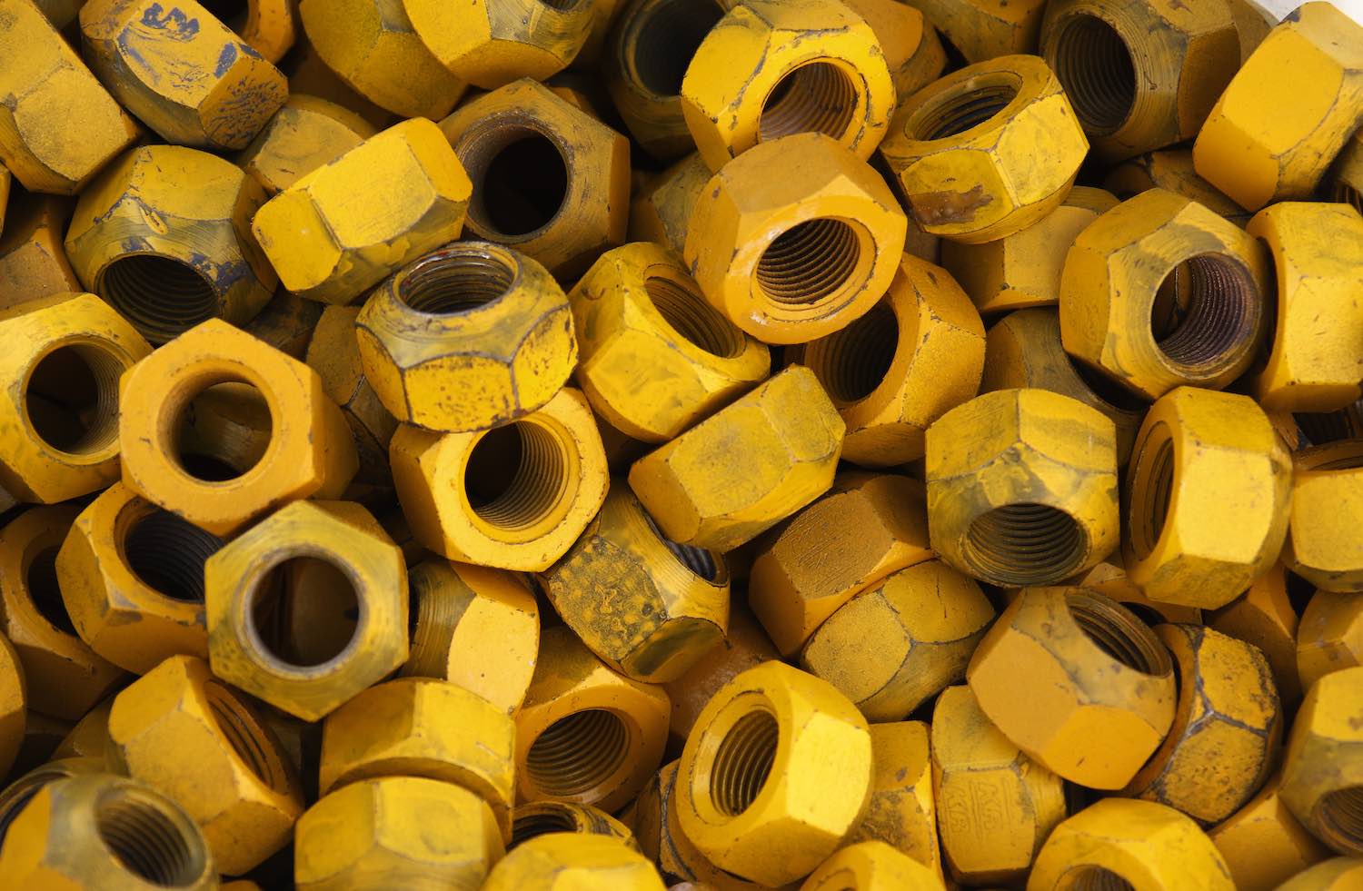 NASCAR lug nuts in a pile at the Bristol Motor Speedway pits