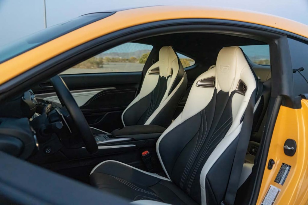 2023 Lexus RC F Carbon Package in metallic yellow with black and white leather interior viewing bolstered racing seats