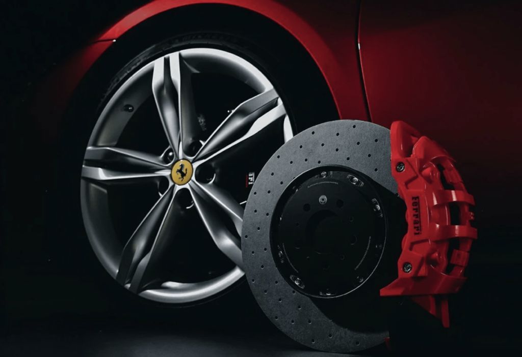 Ferrari mooncake box and pastries leaning against Ferrari