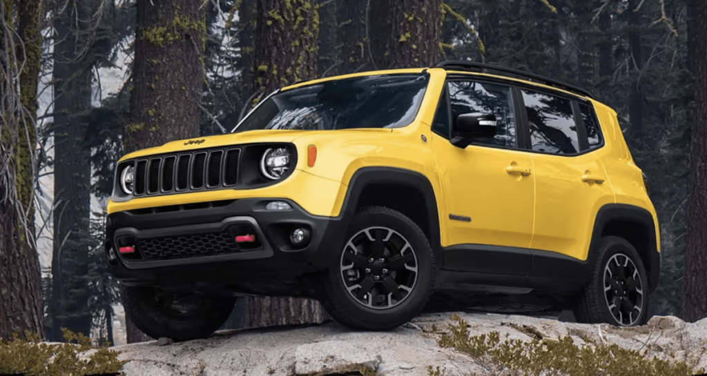 Yellow 2023 Jeep Renegade on rocks