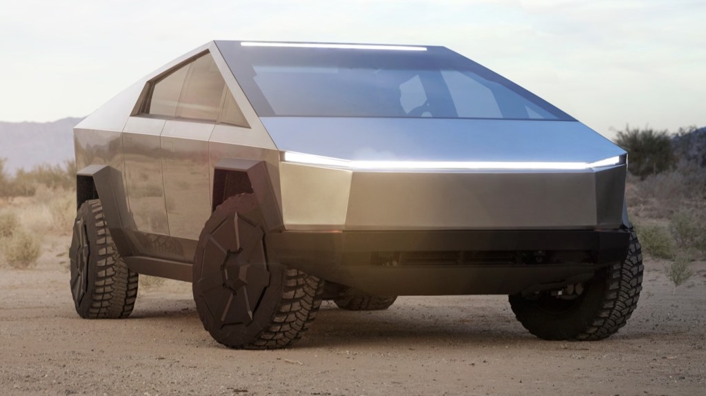 The Tesla Cybertruck  off-roading in sand