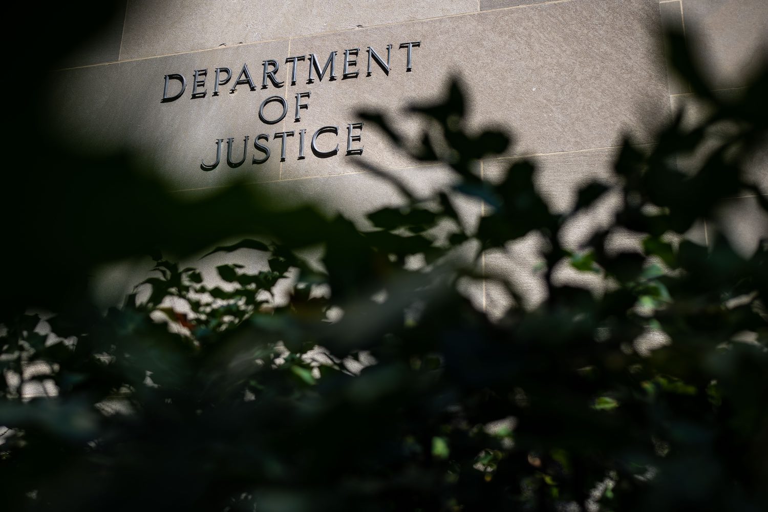 The "Department of Justice" sign on the side of the DOJ building in DC