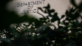 The "Department of Justice" sign on the side of the DOJ building in DC