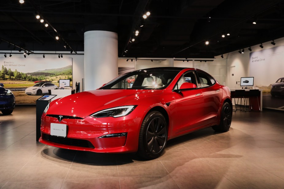 A red Tesla Model S displayed at a Tesla Motors Japan store. Tesla Model S sales are dipping.