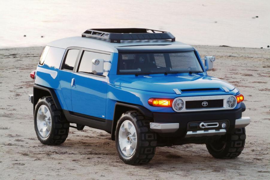 A blue Toyota FJ Cruiser on display.
