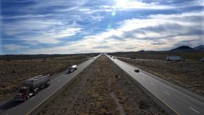 Trucks and cars on a divided Interstate Highway