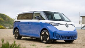 A white and blue Volkswagen ID. Buzz electric microbus.