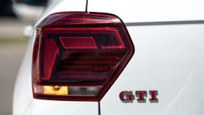 The red, yellow, and white colored bulbs for braking and turn signals on a Volkswagen Polo GTI model