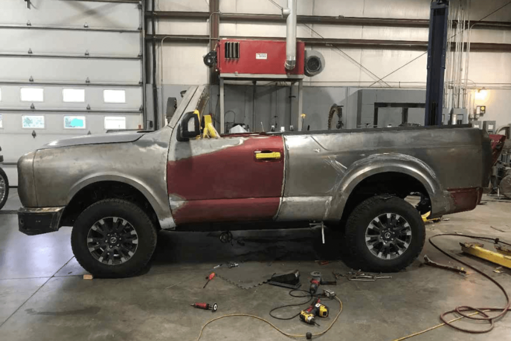 International Scout made from Nissan Titan side view in bare metal