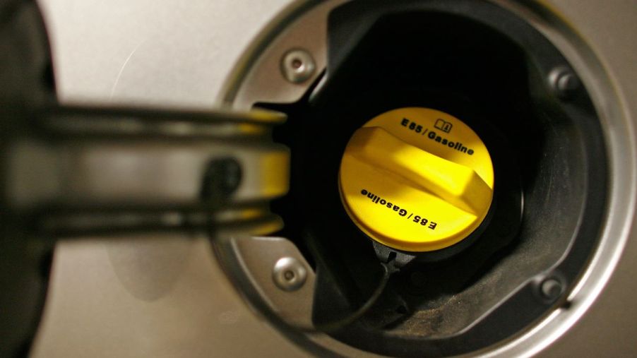 A yellow E85/Gasoline cap on a 2007 Chevy Impala model from a Washington D.C. Enterprise fleet