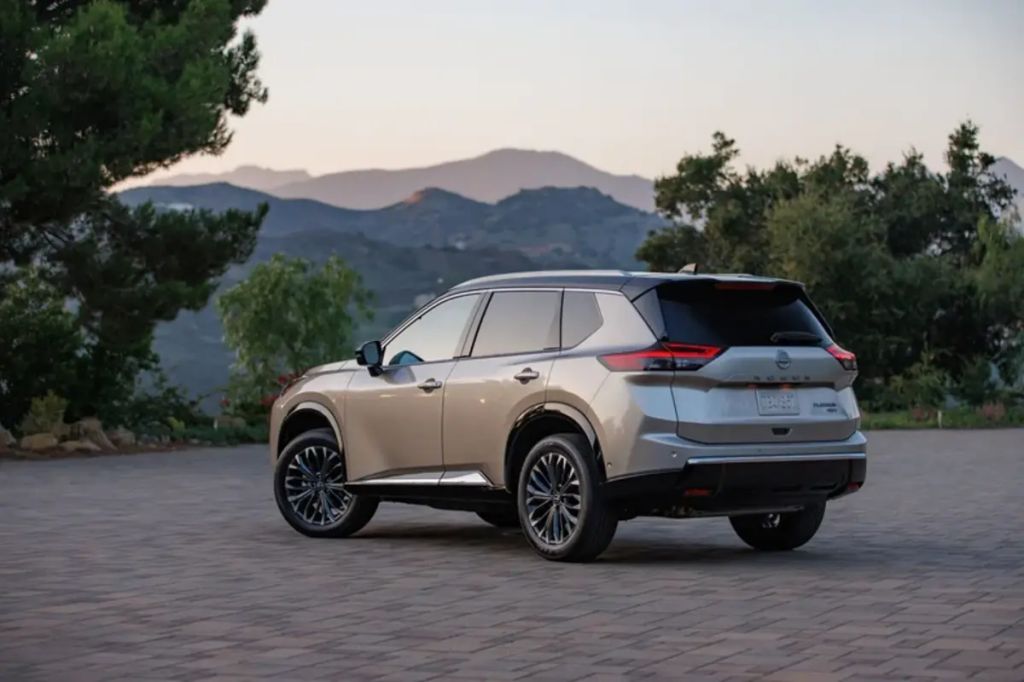 2024 Nissan Rogue with mountains in background