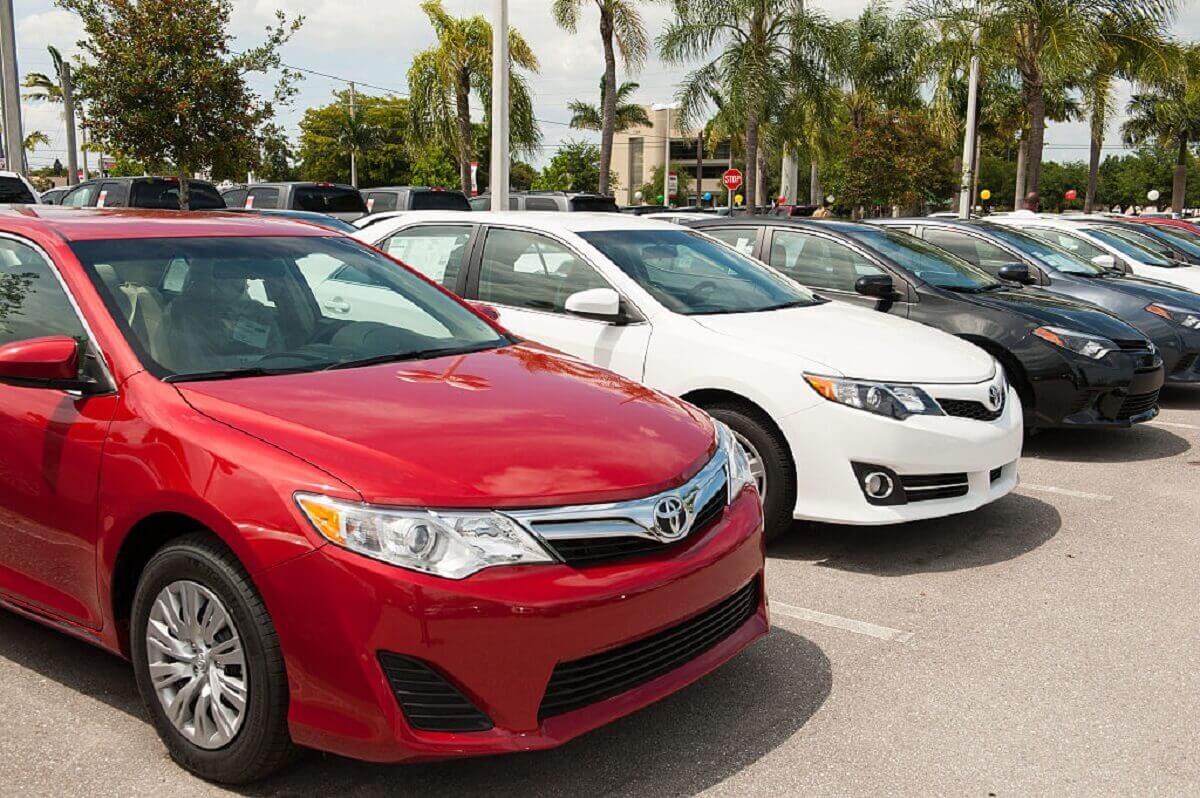 A lot full of used cars outside of West Palm Beach, Florida shows off its Toyota sedans.