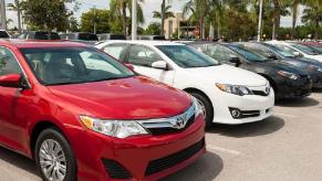A lot full of used cars outside of West Palm Beach, Florida shows off its Toyota sedans.