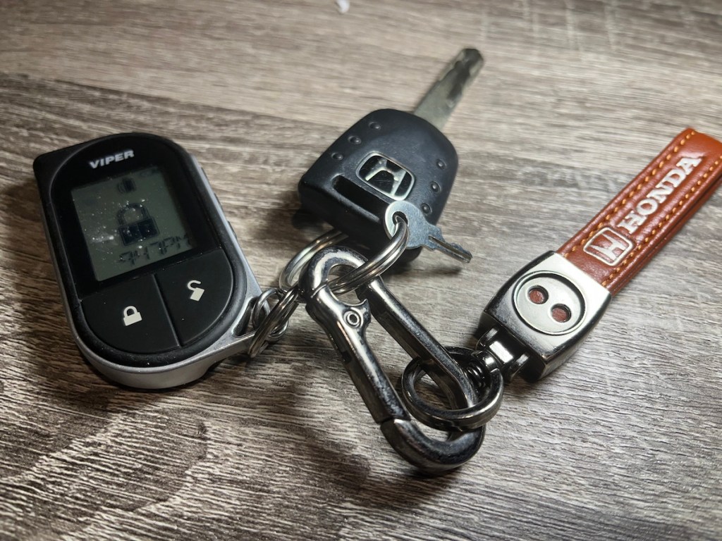 A viper alarm remote on a key chain