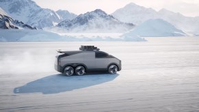 Xpeng six-wheel SUV with flying eVTOL side view looking down