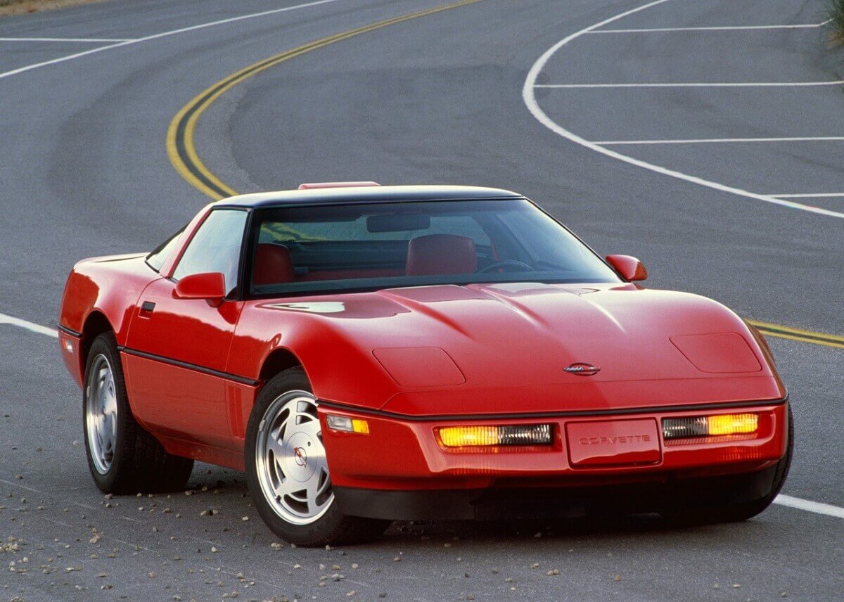 A bright-red C4 Corvette ZR-1 shows off its front-end styling concealing the car's V8.