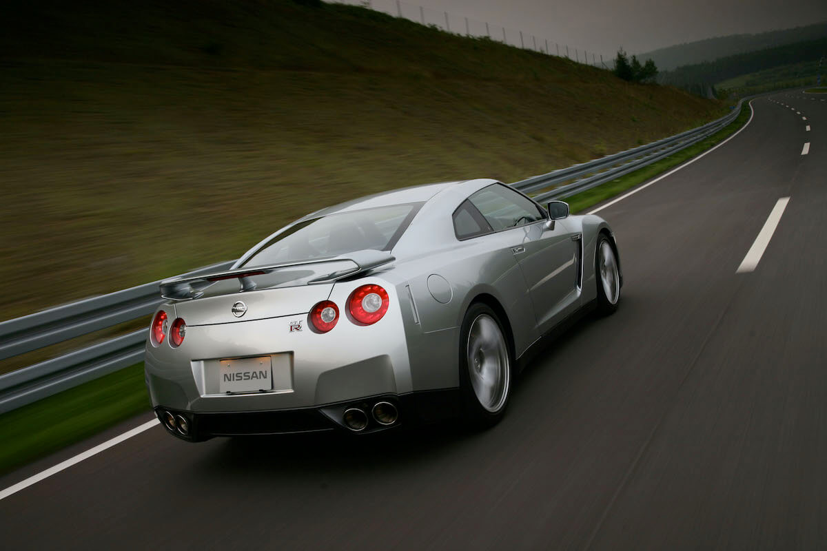 A rear view of the 2009 Nissan GT-R driving