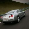 A rear view of the 2009 Nissan GT-R driving