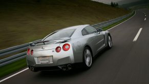 A rear view of the 2009 Nissan GT-R driving