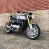 A Silver Ice 2016 Triumph Thruxton R shows off its café racer styling.