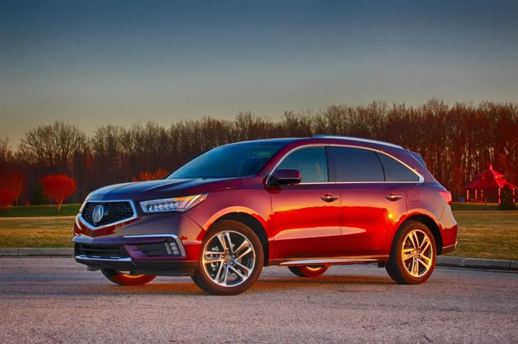 Red 2017 Acura MDX SUV at sunset