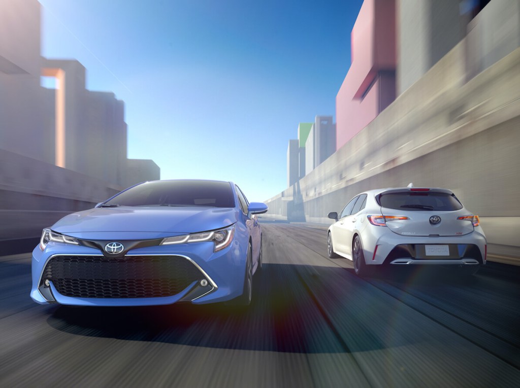 Two 2019 Toyota Corollas drive by each other