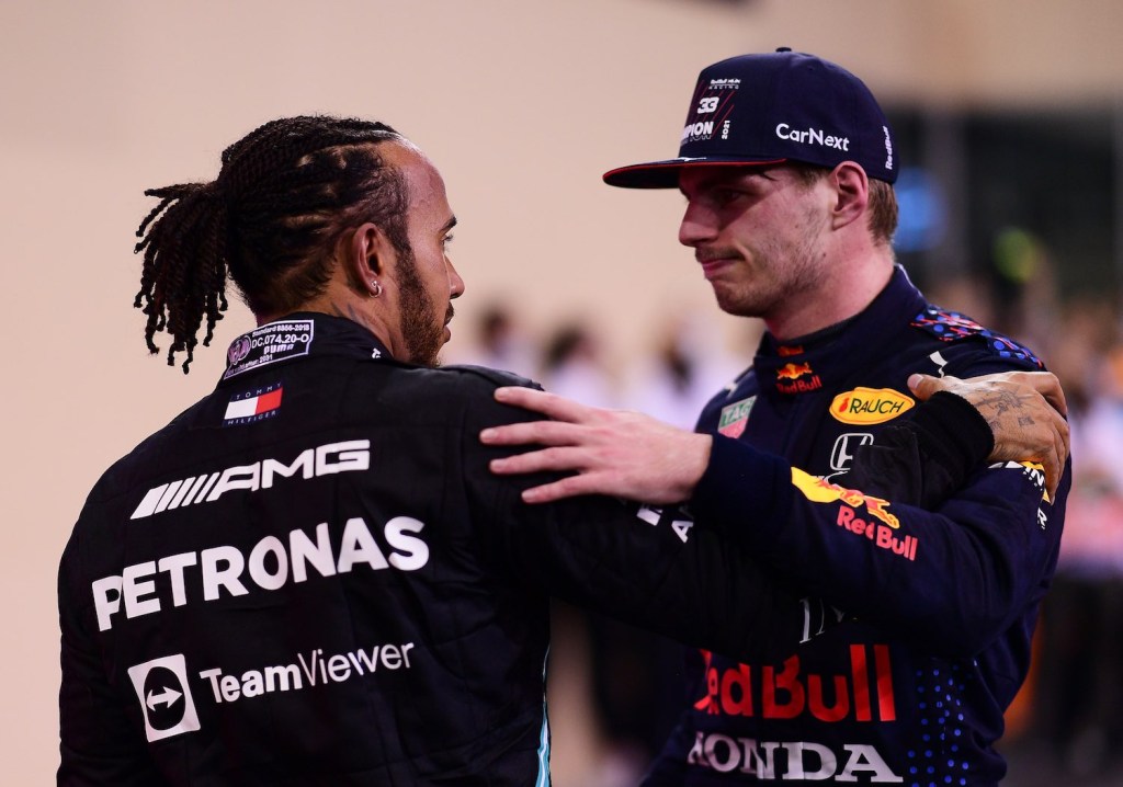2021 Abu Dhabi Formula 1 Grand Prix winner Max Verstappen embraces Lewis Hamilton (2nd place)
