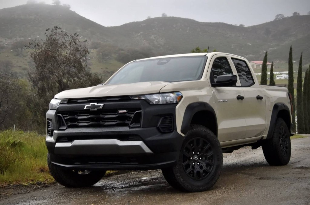 The 2023 Chevy Colorado off-roading in muddy conditions