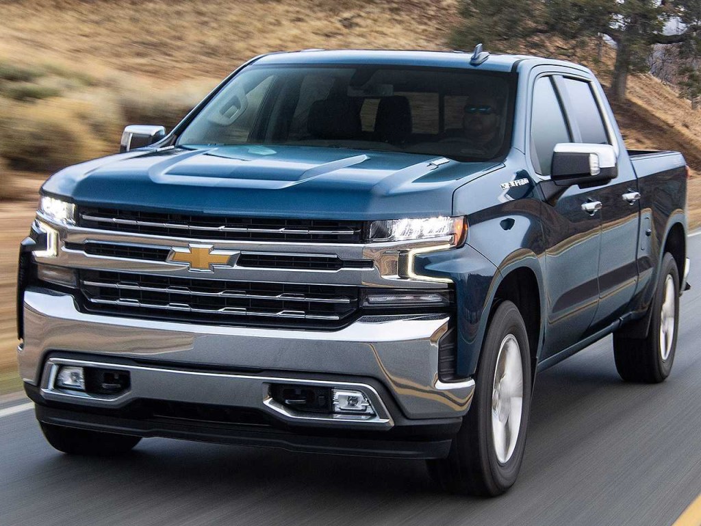 The 2023 Chevy Silverado driving on the road
