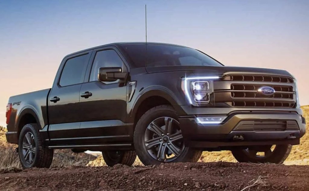 The 2023 Ford F-150 off-roading at dusk