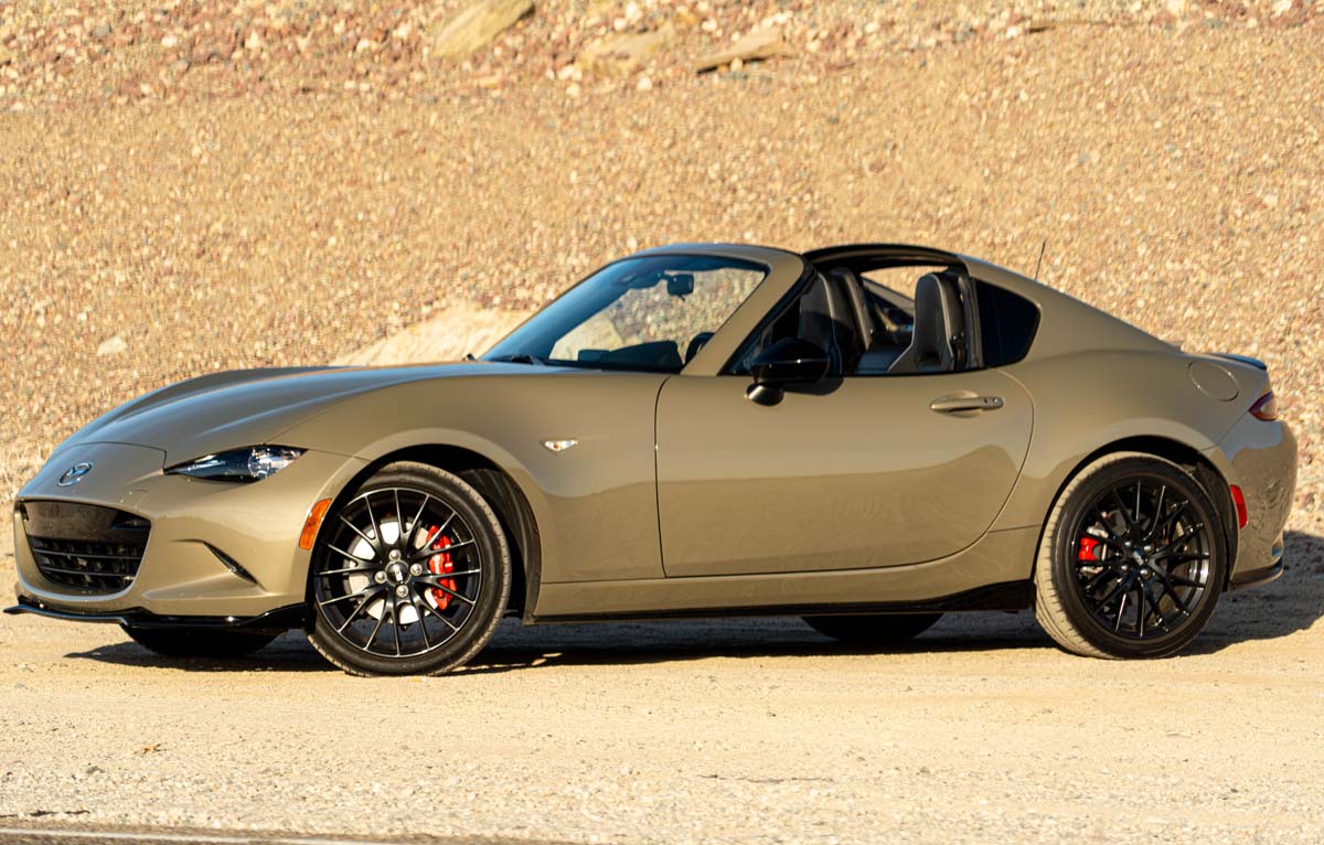 Front/ side profile of 2023 Miata Club in Zircon Sand Metallic photographed on Route 66