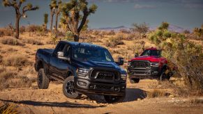 Two 2023 Ram 1500 Classic models off-roading in the desert