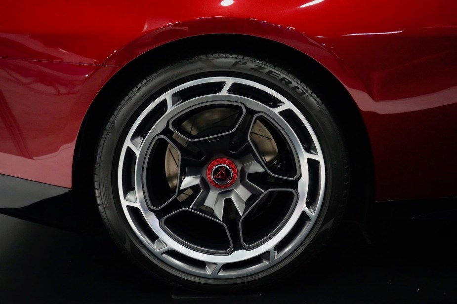The rim of a 2024 Dodge Charger Daytona SRT Banshee with Stellantis' 
"Fratzonic" logo.