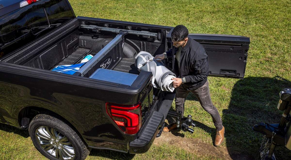 Man using 2024 Ford F-150 Pro Access Tailgate