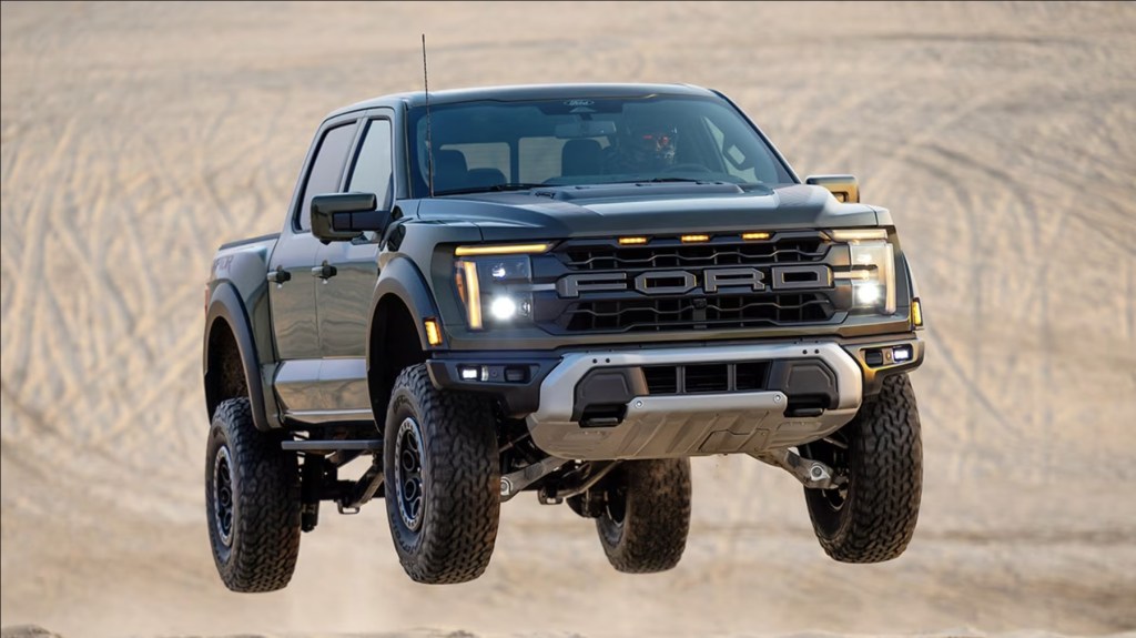 The 2024 Ford F-150 Raptor R jumping sand dunes