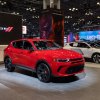 A red 2023 Dodge Hornet at the 2023 New York International Auto Show (NYIAS). The 2024 Hyundai Tucson vs. 2024 Dodge Hornet is a hot debate.