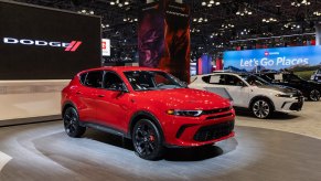 A red 2023 Dodge Hornet at the 2023 New York International Auto Show (NYIAS). The 2024 Hyundai Tucson vs. 2024 Dodge Hornet is a hot debate.
