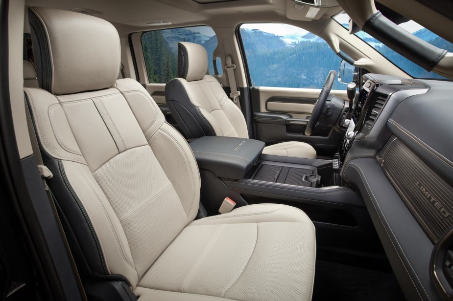 The tan leather interior of a new heavy-duty Ram truck with large blindspots.